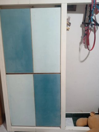 Cabecero de madera azul y verde azulado