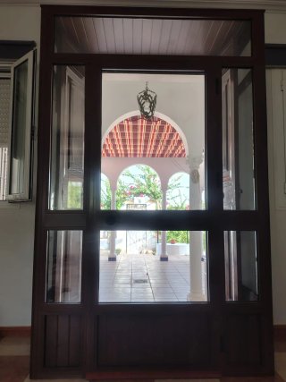 Puerta aluminio doble cristal