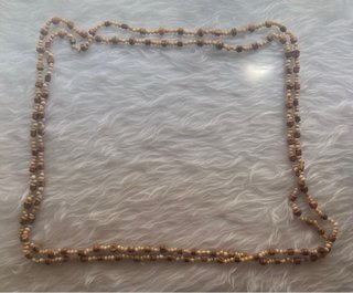 Tarro con joyas variadas