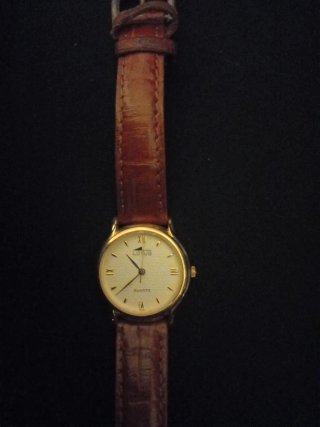 Reloj Lotus Dorado y Marrón