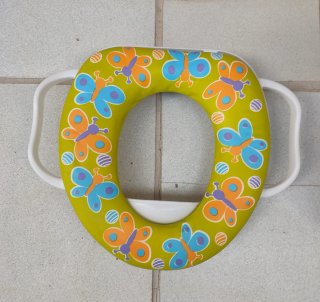 Orinal y adaptador para bebé con diseño