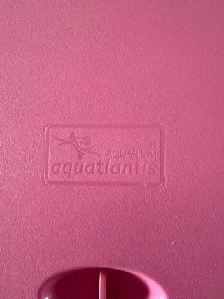 Pecera rosa con accesorios