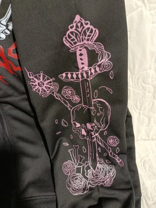 Sudadera con cremallera y estampado