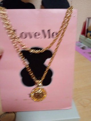 Collar de fantasía dorado con osito