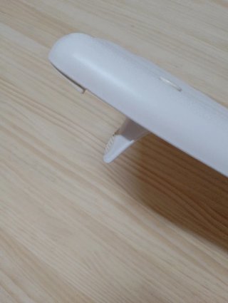 Asiento de bañera blanco y naranja