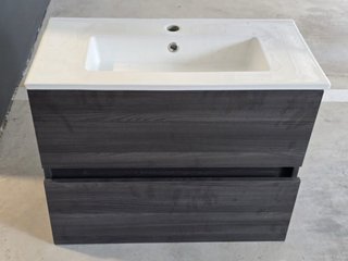Lavabo Porcelanosa con mueble de madera