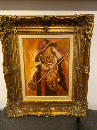 Cuadro de lienzo con marco dorado