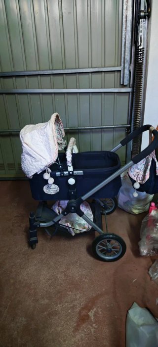Cochecito de muñecas convertible