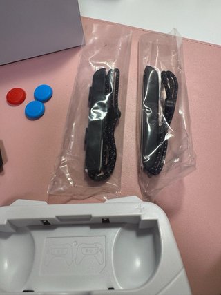 Nintendo Switch OLED blanca y negra + accesorios