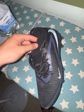 Botas de tacos Nike negras y azules
