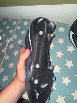 Botas de tacos Nike negras y azules