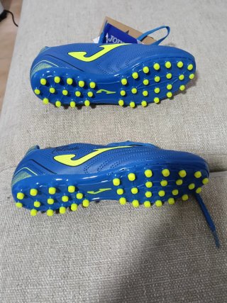 Zapatillas fútbol Joma multitaco azul/amarillo