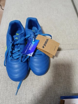 Zapatillas fútbol Joma multitaco azul/amarillo
