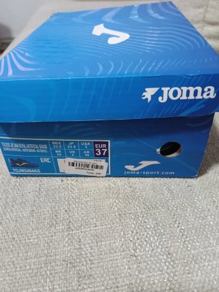 Zapatillas fútbol Joma multitaco azul/amarillo
