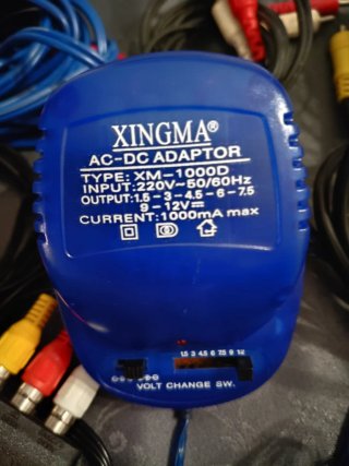 Lote Adaptador AC/DC XINGMA y cables