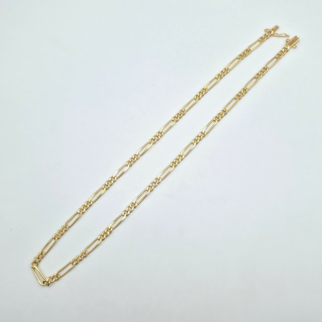 Cadena de oro de 18k. Fígaro. 25.48 g. 51cm