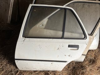 Puerta trasera izquierda Peugeot 205