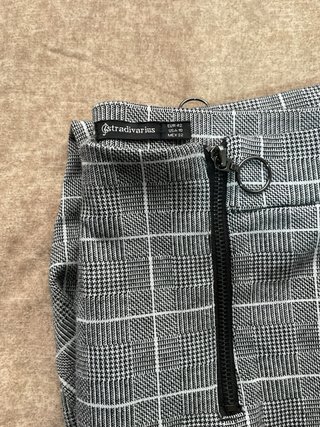 Pantalón cuadros grises con cremalleras