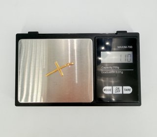 Colgante Cruz de oro de 18k, 1.1 g.