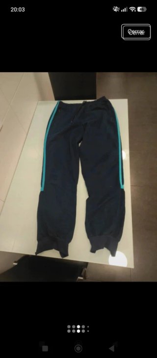 Pantalón Adidas azul con rayas turquesa