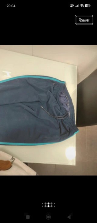 Pantalón Adidas azul con rayas turquesa