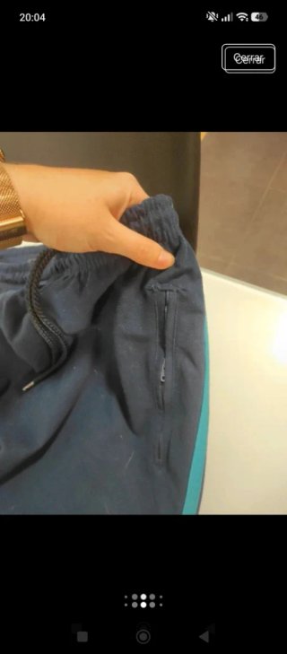 Pantalón Adidas azul con rayas turquesa