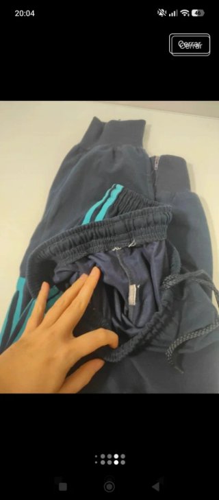 Pantalón Adidas azul con rayas turquesa