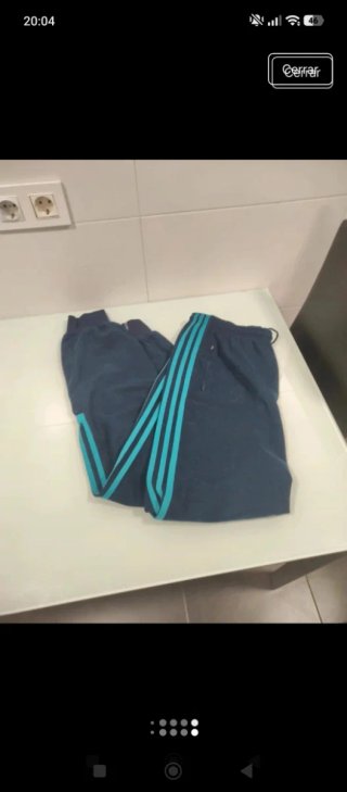 Pantalón Adidas azul con rayas turquesa