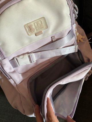 Mochila lila con estampado de cuadros