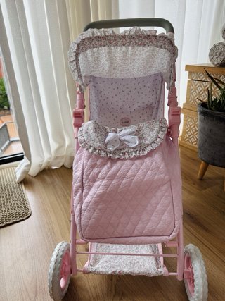 Silla de paseo para muñecas rosa