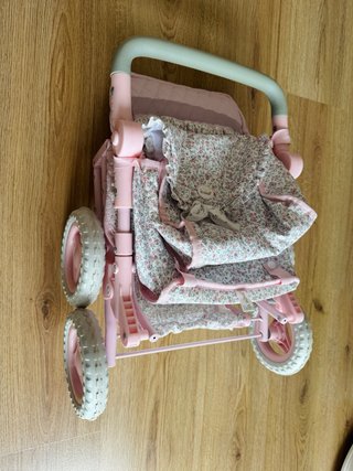 Silla de paseo para muñecas rosa