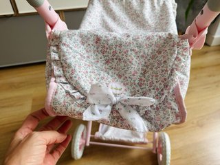 Silla de paseo para muñecas rosa