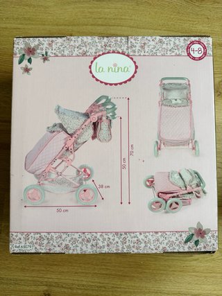 Silla de paseo para muñecas rosa