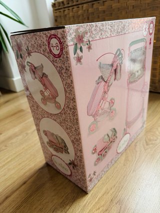 Silla de paseo para muñecas rosa