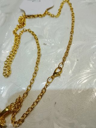 Collana con ciondolo ancora dorata