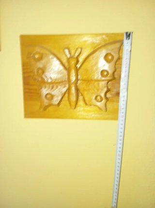 Cuadro de madera mariposa tallada.