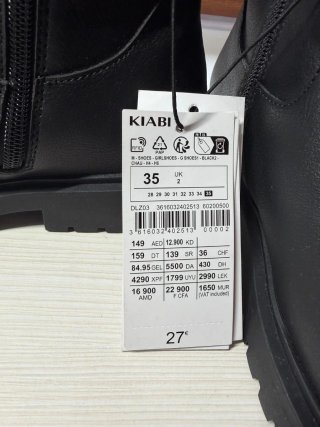 Botas altas negras niña.