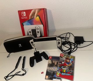 Nintendo Switch OLED + 2 Juegos + SD + funda