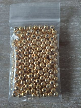Perlas doradas para bisutería