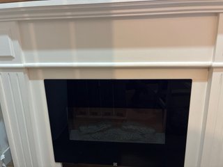 Chimenea eléctrica con mueble de madera