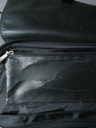 Maleta de viaje negra cuero