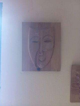 Cuadro decorativo de madera tallada