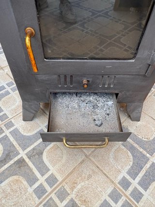 Chimenea horno, de leña,  hecha de hierro fundido