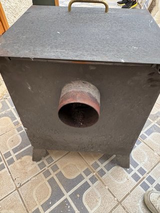 Chimenea horno, de leña,  hecha de hierro fundido