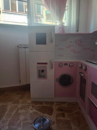 Cocinita infantil rosa con accesorios