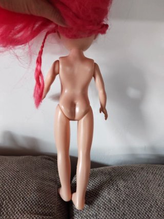 Muñeca 36 cm pelo rosa ojos azules
