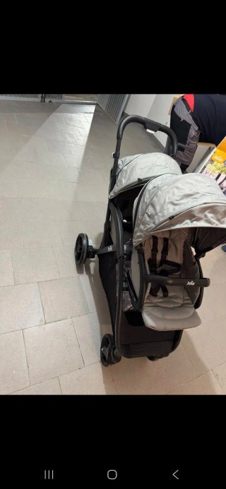 Silla de paseo gemelar Joie gris