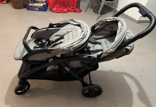 Silla de paseo gemelar Joie gris