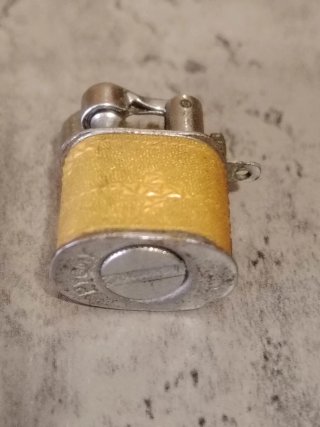 Mechero antiguo vintage metal y piel