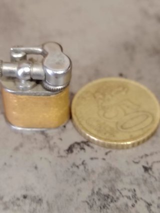 Mechero antiguo vintage metal y piel